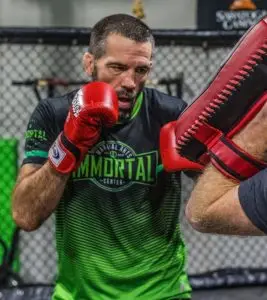 Matt Brown doing pad work at Immortal Martial Arts Center